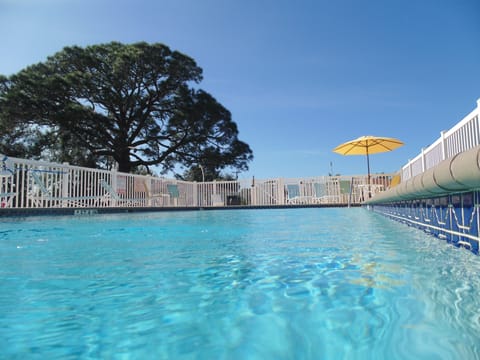 Outdoor pool, pool umbrellas, sun loungers