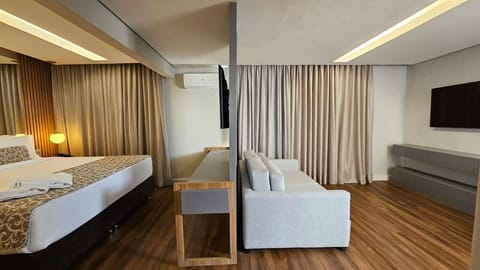 Exclusive Double Room | Minibar, in-room safe, desk, blackout drapes