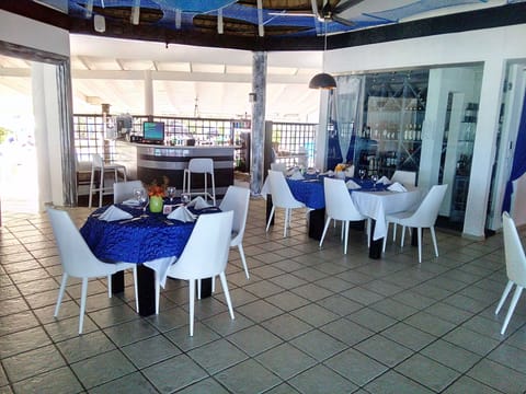 Breakfast, lunch, dinner served; Italian cuisine, beach views 
