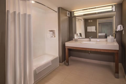 Room, 2 Queen Beds (Hearing Accessible) | Bathroom | Combined shower/tub, hair dryer, towels