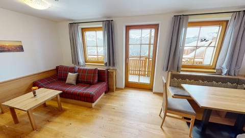 Comfort Apartment I | Living area | Flat-screen TV