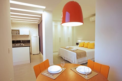 Premium Apartment | Living area | 32-inch flat-screen TV with cable channels, TV