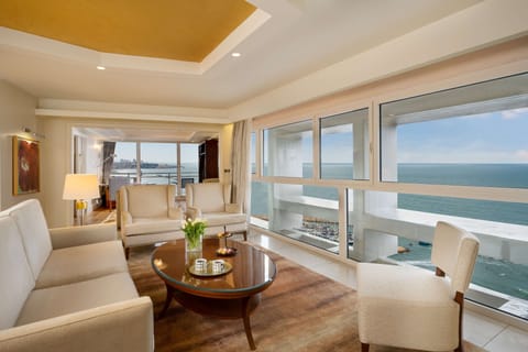 Presidential Vista Suit | Living area | 48-inch LCD TV with cable channels, TV, pay movies