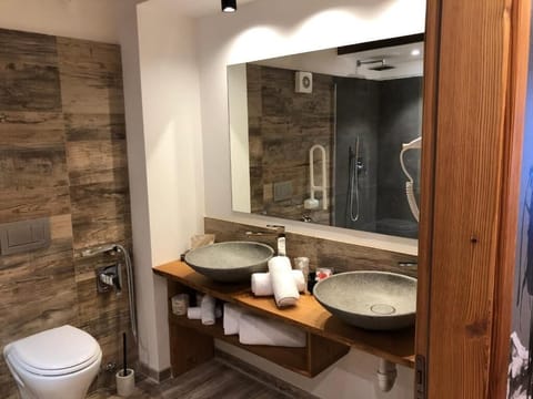 Hair dryer, bidet, towels, soap