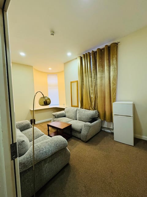 Deluxe Suite | Living area | Flat-screen TV