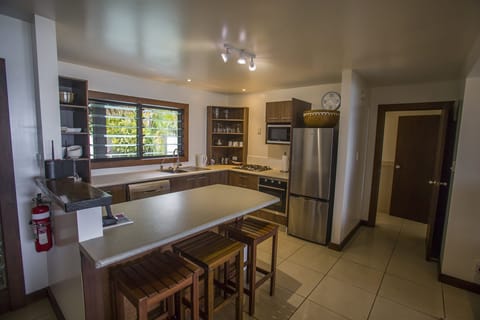 One Bedroom Villa - Beachfront | Private kitchen | Full-size fridge, microwave, oven, stovetop