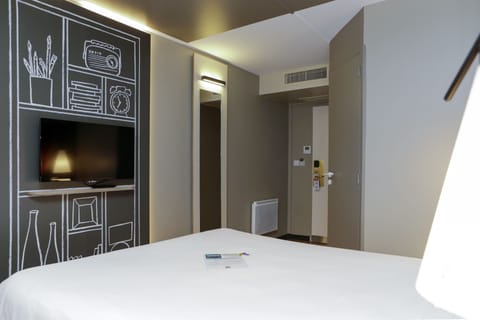 Desk, laptop workspace, blackout drapes, iron/ironing board