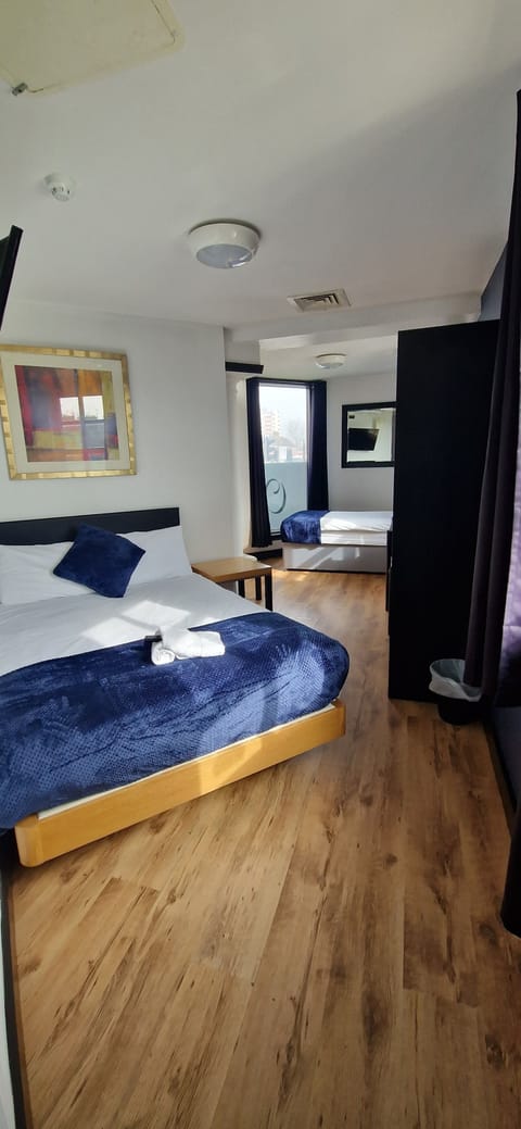 Standard Triple Room | Iron/ironing board, free WiFi, bed sheets