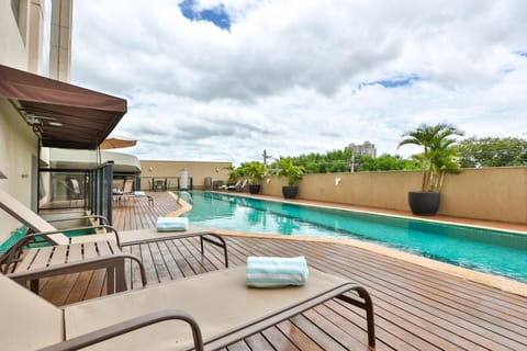 Outdoor pool, pool umbrellas, sun loungers