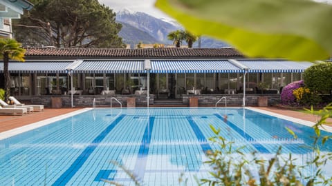 Indoor pool, outdoor pool, pool umbrellas, sun loungers