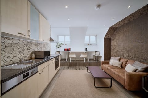 Exclusive Apartment, 2 Bedrooms, Non Smoking, 2nd Floor or Attic (Final Cleaning Fee +65,00 EUR) | Living area | Flat-screen TV