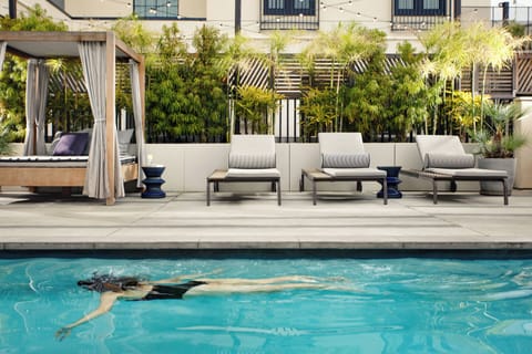 Outdoor pool, pool umbrellas, sun loungers