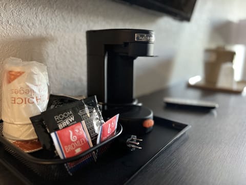 Suite, 1 King Bed, Non Smoking | Desk, laptop workspace, iron/ironing board, cribs/infant beds