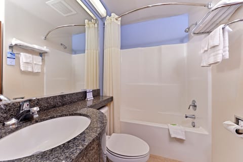 Combined shower/tub, deep soaking tub, free toiletries, hair dryer