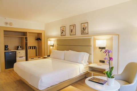 Premium Room, 1 King Bed, Partial Ocean View | In-room safe, blackout drapes, iron/ironing board, free WiFi