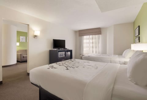 Suite, Multiple Beds, Non Smoking | Premium bedding, minibar, desk, blackout drapes