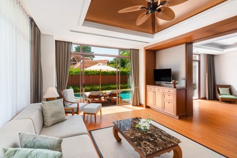 Grand Deluxe Pool Villa | Living area | LCD TV, DVD player