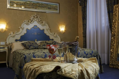 Family Room | Minibar, in-room safe, desk, iron/ironing board