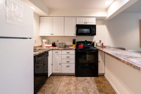 Suite, 1 Bedroom, Non Smoking | Private kitchen | Fridge, microwave, stovetop, coffee/tea maker