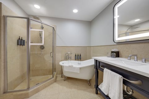 Separate tub and shower, deep soaking tub, rainfall showerhead