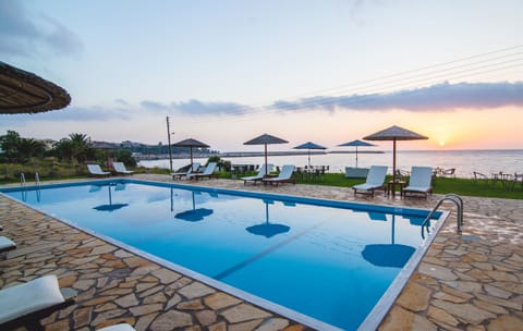 Seasonal outdoor pool, pool umbrellas, sun loungers