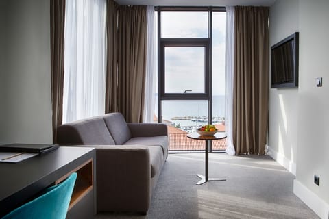 Senior Suite, Sea View | Living room | Plasma TV