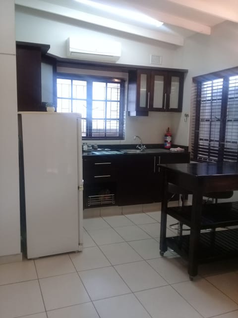 The Palm Cottage | Private kitchen | Microwave, coffee/tea maker