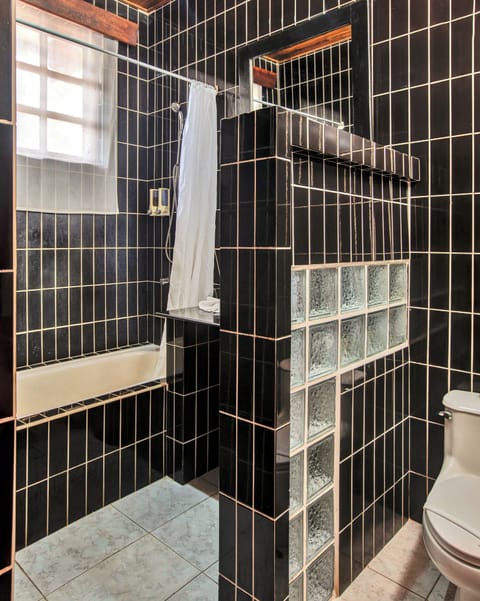 Combined shower/tub, deep soaking tub, free toiletries, hair dryer