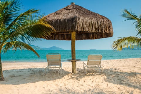 On the beach, sun loungers, beach umbrellas, beach towels