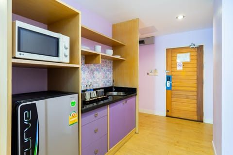 Family Suite, 2 Bedrooms, City View | Private kitchenette | Full-size fridge, microwave