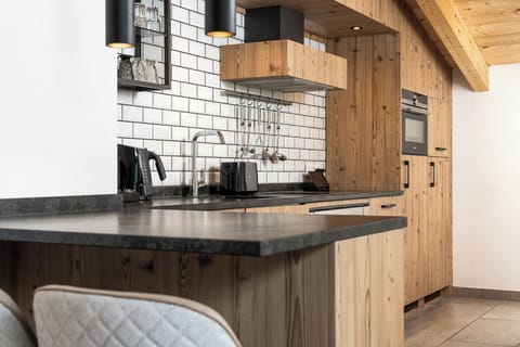 3-bedroom penthouse with private sauna | Private kitchen | Espresso maker, coffee/tea maker, electric kettle, highchair