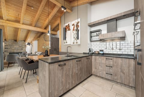 4-bedroom penthouse with private sauna | Private kitchen | Espresso maker, coffee/tea maker, electric kettle, highchair