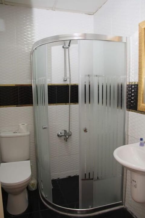 Shower, free toiletries, hair dryer, slippers