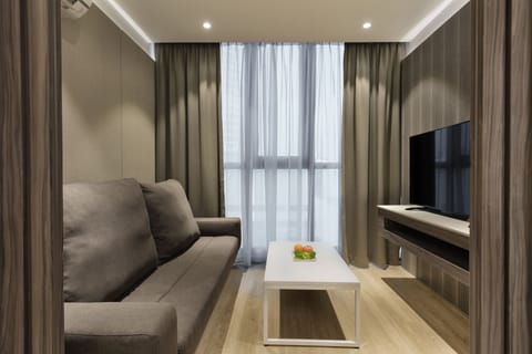 The Serene Suite | Living area | 50-inch LCD TV with satellite channels, TV