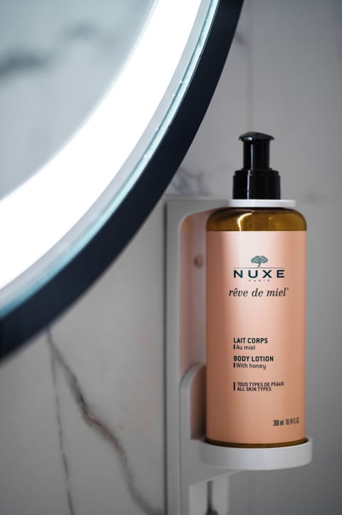 Shower, rainfall showerhead, eco-friendly toiletries, hair dryer