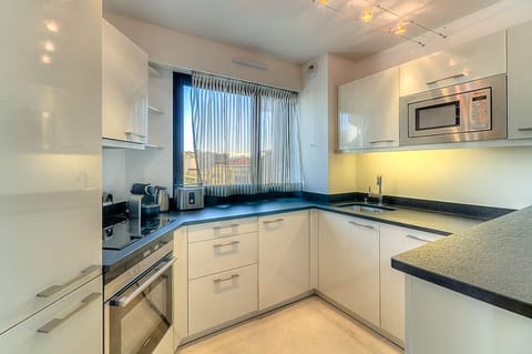 Apartment, 2 Bedrooms | Private kitchen | Full-size fridge, microwave, oven, stovetop