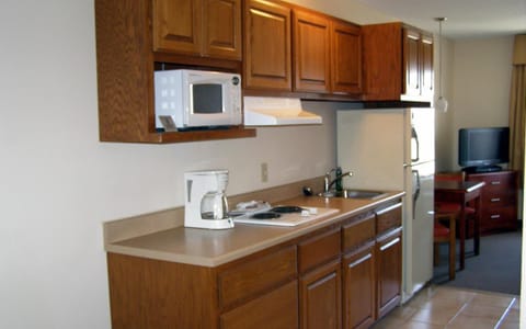 Fridge, microwave, stovetop, coffee/tea maker