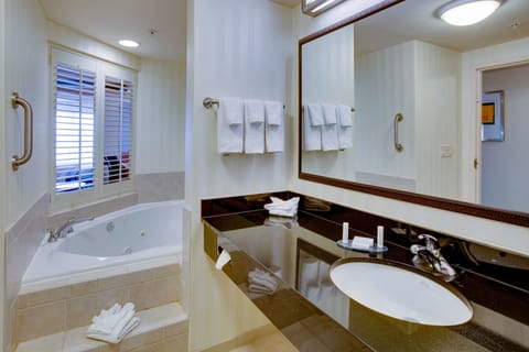 Room, 1 King Bed with Sofa bed | Bathroom | Combined shower/tub, free toiletries, hair dryer, towels