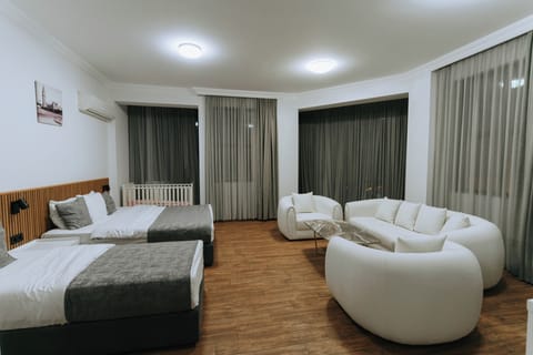 Luxury Triple Room, Private Bathroom | Premium bedding, pillowtop beds, in-room safe, desk