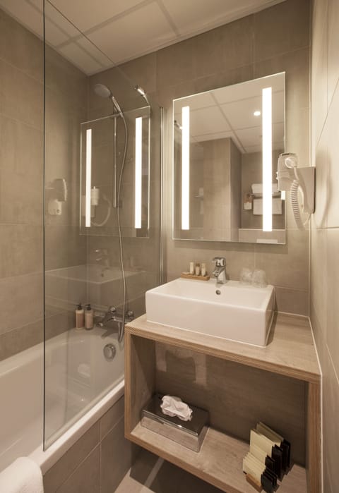 Eco-friendly toiletries, hair dryer, towels