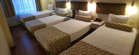 Standard Triple Room | Premium bedding, free minibar items, desk, soundproofing