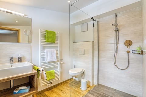 Deluxe Double Room, Balcony, Mountain View | Bathroom | Shower, free toiletries, hair dryer, towels