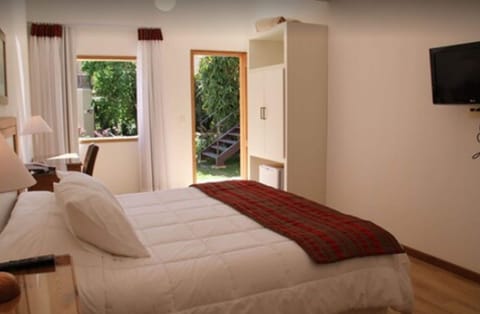 Minibar, desk, laptop workspace, blackout drapes