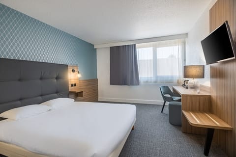 Comfort Double Room, Garden View | Desk, blackout drapes, soundproofing, cribs/infant beds