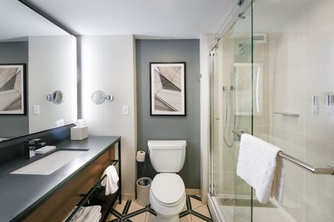 Standard Room, 2 Queen Beds | Bathroom | Combined shower/tub, free toiletries, hair dryer, towels