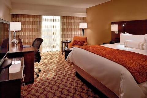 Premium bedding, down comforters, minibar, in-room safe