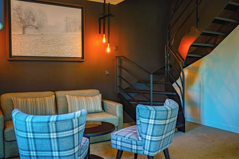 Duplex | Living area | Flat-screen TV