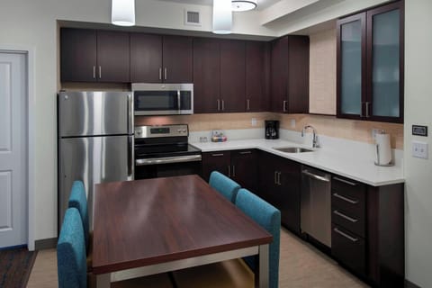 Suite, 2 Bedrooms | Private kitchen | Full-size fridge, microwave, stovetop, dishwasher