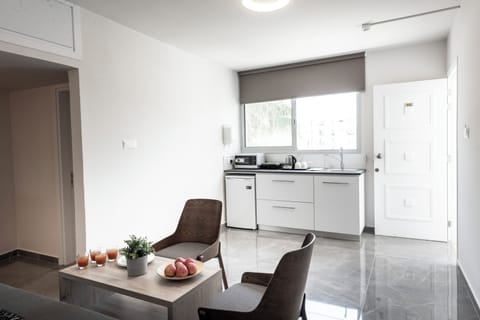 Deluxe Apartment, Balcony, City View (Family) | Private kitchen | Fridge, electric kettle, cookware/dishes/utensils