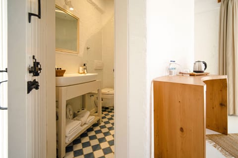 Standard Double Room | Bathroom | Shower, designer toiletries, hair dryer, slippers